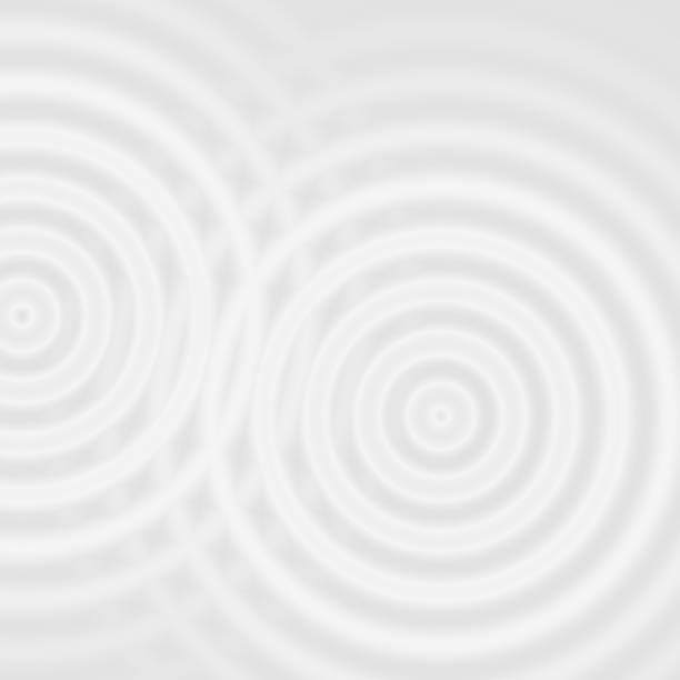istock Abstract white rings sound oscillating, circle spin soft background 1128107797
