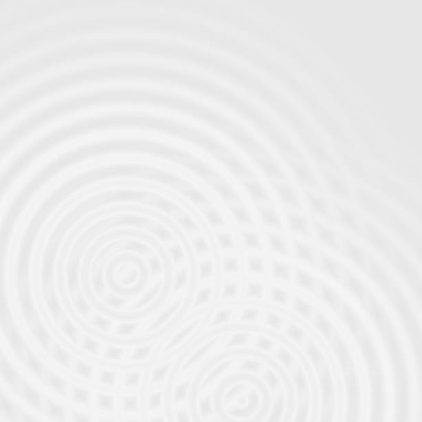 istock Abstract white rings sound oscillating, circle spin soft background 1128107800
