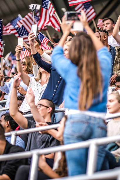 istock US sport fans with flags 1128114570