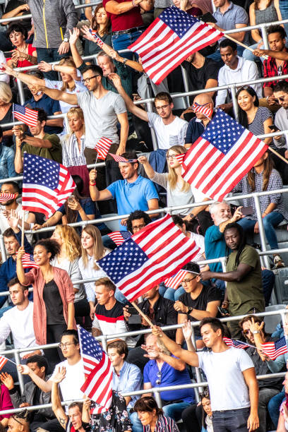 istock USA sports supporters with flags 1128114575