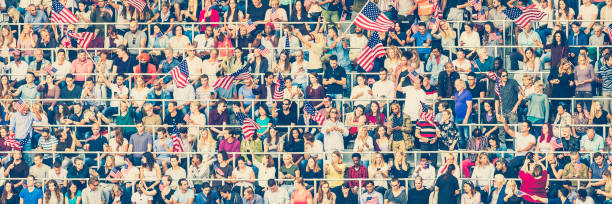 American sports fans with US flags