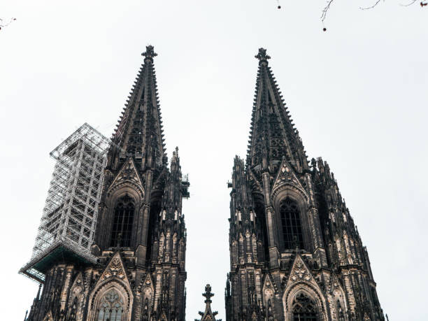 istock Cologne Cathedral with scaffold against cloudy sky 1128116422