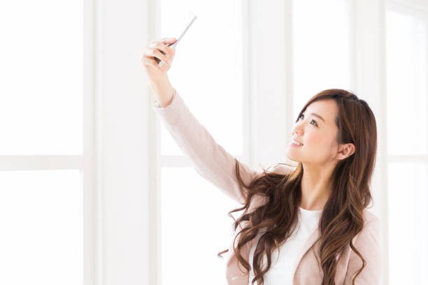 istock young attractive asian woman 1128116426
