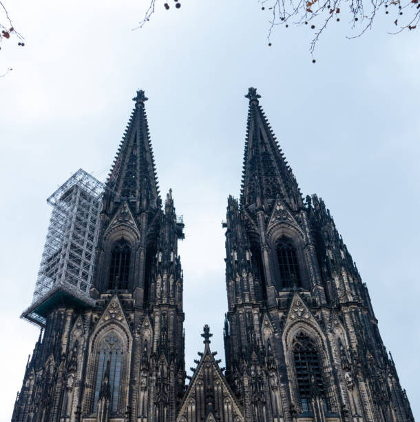 istock Cologne Cathedral with scaffold against cloudy sky 1128116449