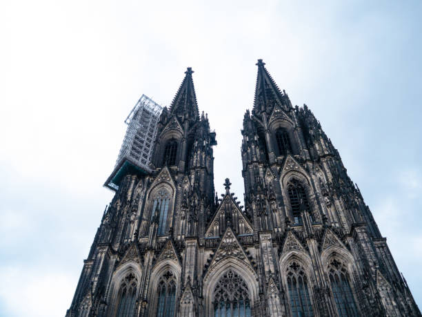 istock Cologne Cathedral with scaffold against cloudy sky 1128116461