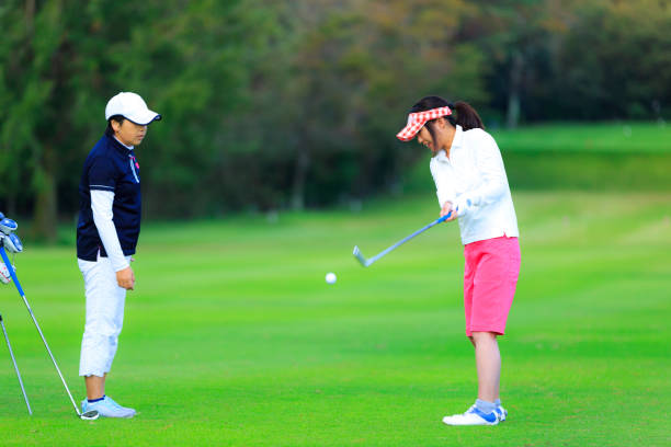 istock Golf lessons and Japanese women 1128120372