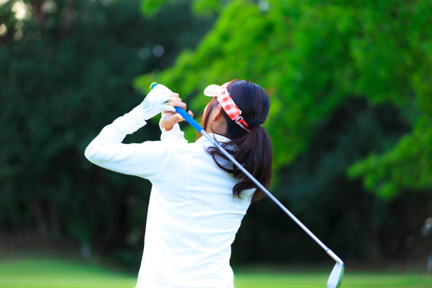 istock Asian woman golf beginner 1128122415