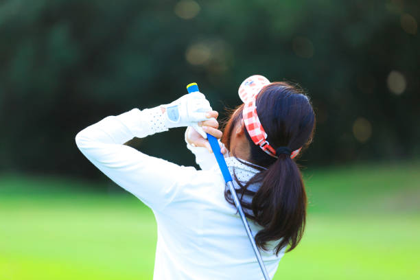 istock Asian woman golf beginner 1128122418