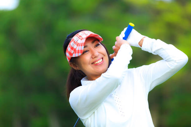 istock Asian woman golf beginner 1128122420