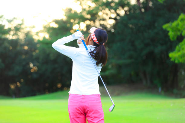 istock Asian woman golf beginner 1128122426