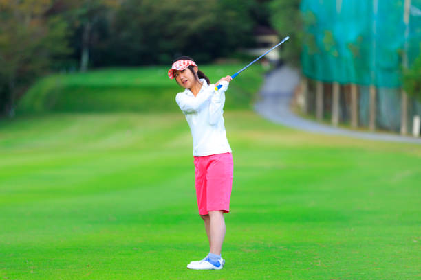 istock Asian woman golf beginner 1128122436
