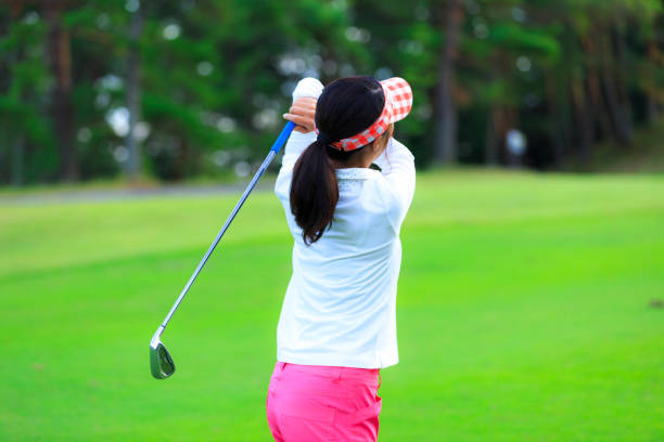 istock Asian woman golf beginner 1128122448