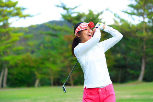 Asian woman golf beginner