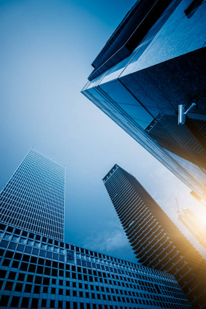 istock Low angle view of modern metallic skyscrapers 1128131172