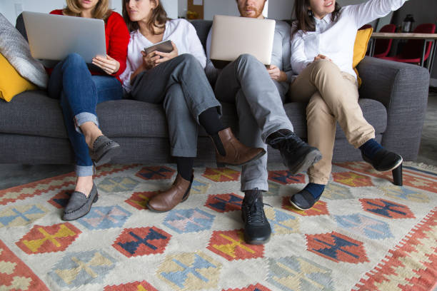 istock Group of four working at home 1128131945