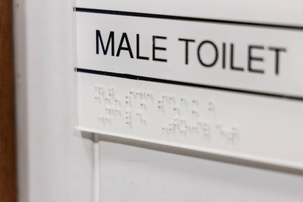istock Disability friendly toilet with braille tactile on signage 1128136120