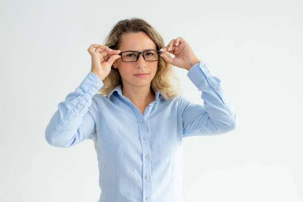 istock Focused frowning office girl staring at camera 1128136136