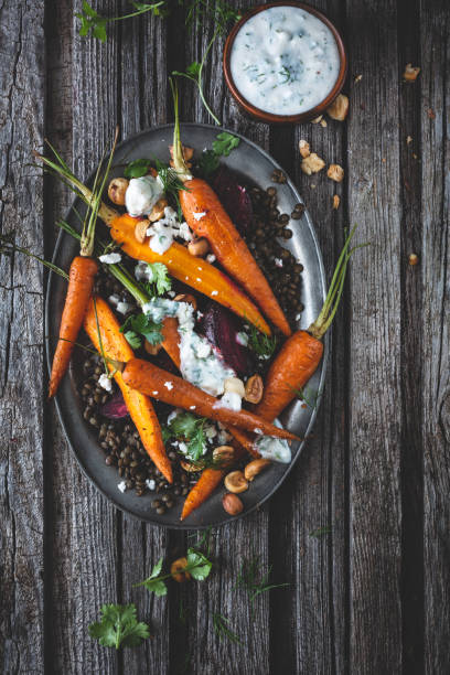 Lentil Salad, Roasted Carrots and Beets Lentil Salad , Roasted Carrots and Beets grillade stock pictures, royalty-free photos & images