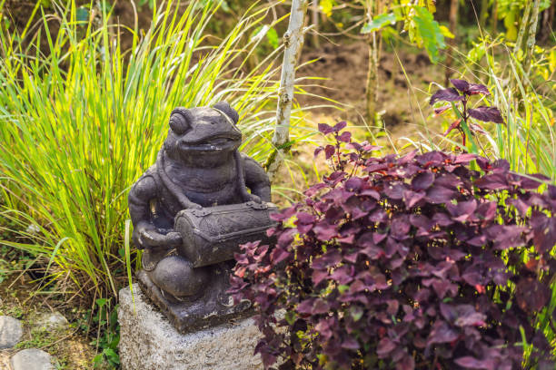 istock Stone balinese mossy statue Bali island Indonesia 1128142449