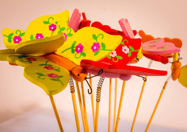 Decorative butterflies on the needles to decorate the table, bouquets.