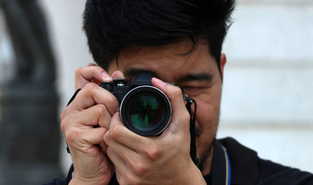 istock Photographer taking the photo. 1128156135