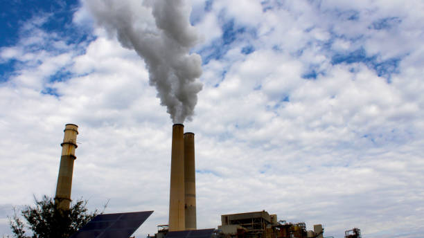 istock Power Plant Smoke Pipes 1128162364