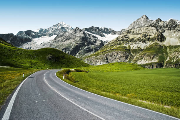 istock Winding mountain road without cars 1128162439