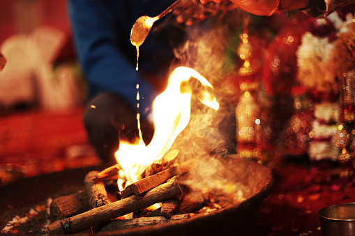 Hindu ritual hawan fere on wedding day.