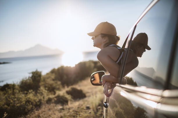 istock Woman on the road trip 1128162699