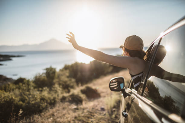 istock Woman on the road trip 1128162724