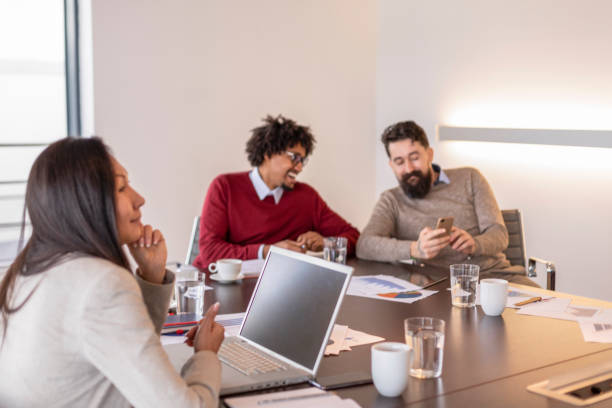 istock Multi-ethnic group of colleagues at meeting 1128162785