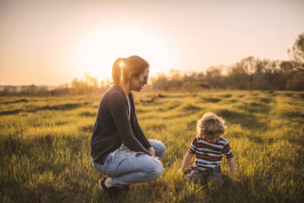 istock Mother and son having fun outdoors 1128163595