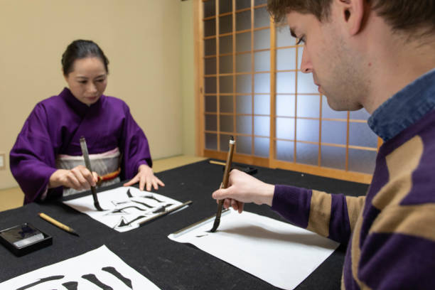 istock Foreign people learning Japanese culture 1128165715