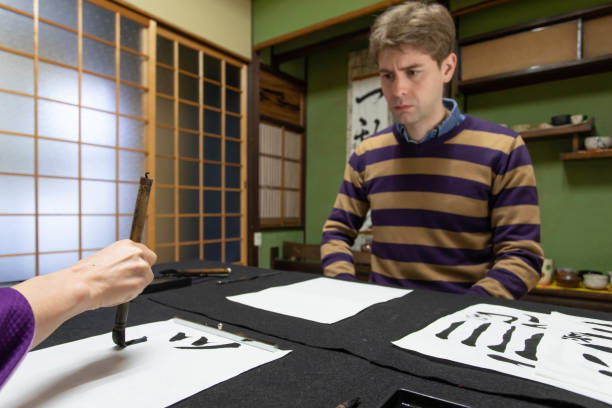 istock Foreign people learning Japanese culture 1128165869