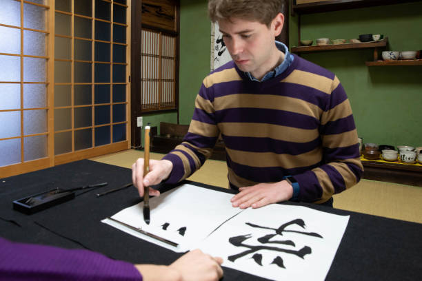 istock Foreign people learning Japanese culture 1128165933