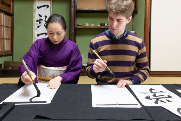 istock Foreign people learning Japanese culture 1128165963