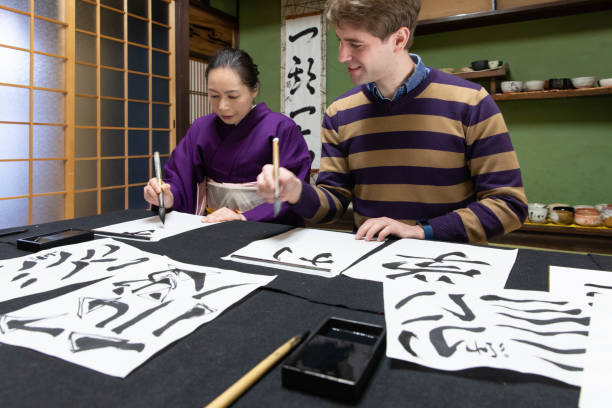 istock Foreign people learning Japanese culture 1128166063