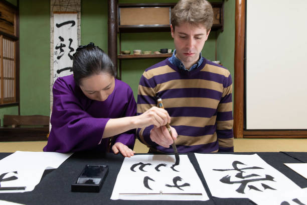 istock Foreign people learning Japanese culture 1128166724