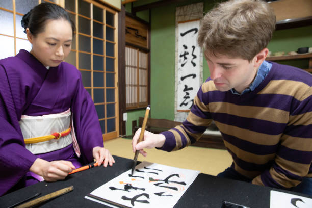 istock Foreign people learning Japanese culture 1128166862