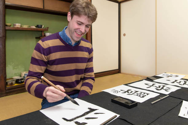 istock Foreign people learning Japanese culture 1128172237