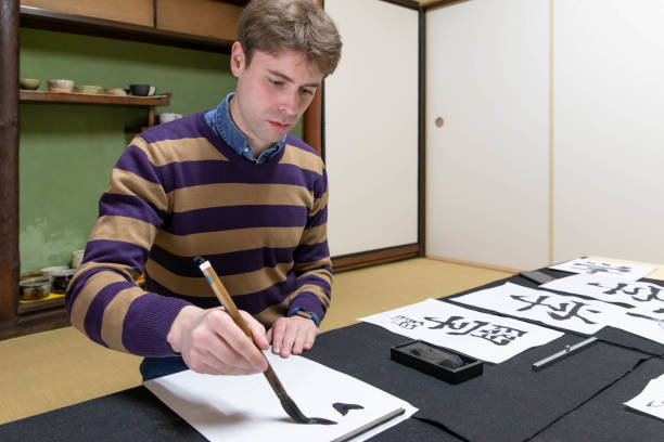 istock Foreign people learning Japanese culture 1128172261