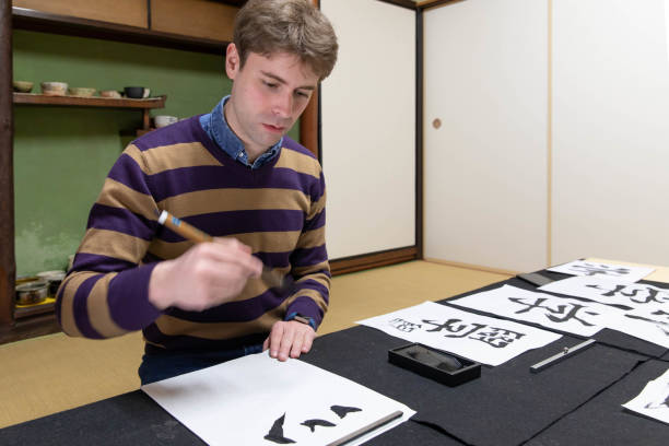 istock Foreign people learning Japanese culture 1128172296