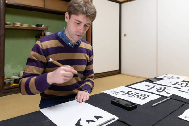 istock Foreign people learning Japanese culture 1128172313