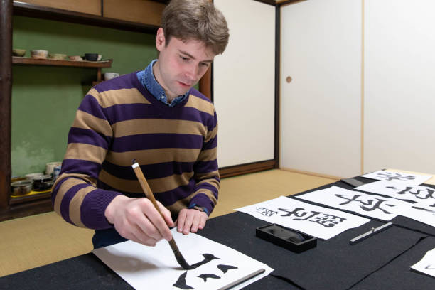 istock Foreign people learning Japanese culture 1128172364