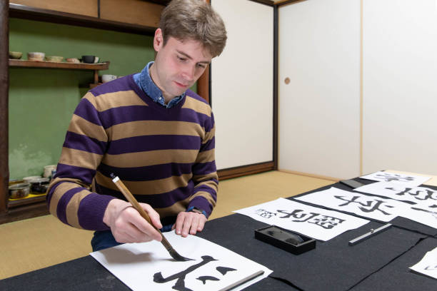 istock Foreign people learning Japanese culture 1128172375