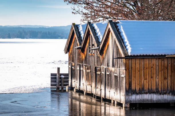 old boathouses old boathouses at the staffelsee lake in bavaria lake staffelsee photos stock pictures, royalty-free photos & images