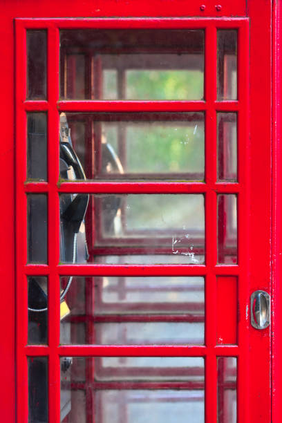 istock Telephone Booth Door Close Up 1128179401
