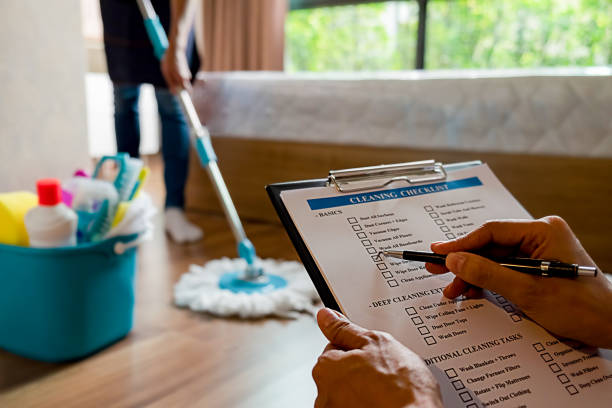 professional cleaning service team working with cleaning equipment in room. cleaning service concept. - trabalho de casa imagens e fotografias de stock