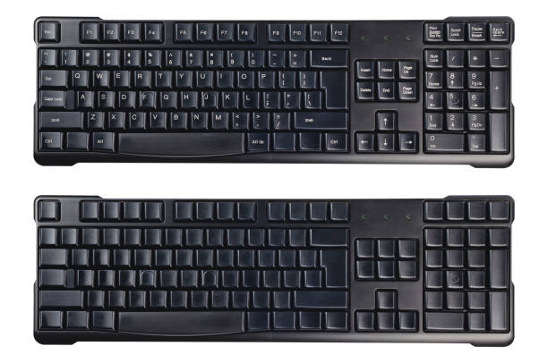 istock Black plastic wireless computer keyboards with symbols and without isolated on white background. Top view 1128181045