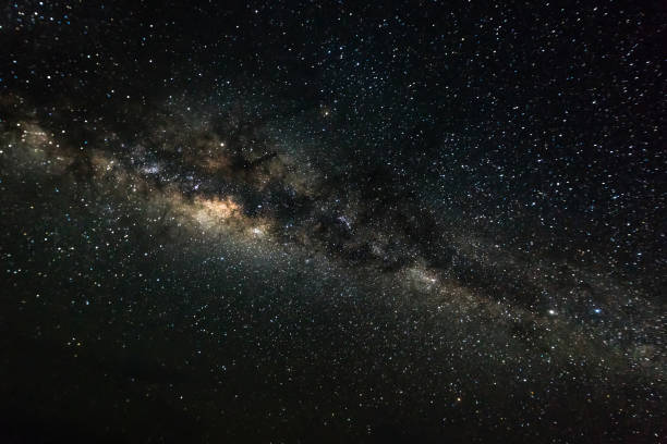 istock Deep space background with stardust and shining star. Milky way cosmic background. Image noise due to high ISO 1128182660